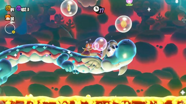 Une capture d’écran de Super Mario Bros. Wonder de Bubble Daisy chevauchant le dos d’un dragon soufflant des bulles.