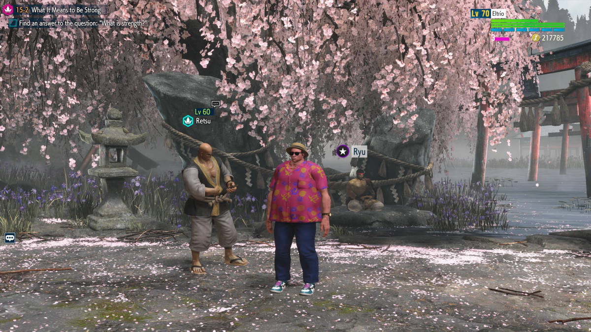 Une capture d’écran Street Fighter 6 du temple Genbu, avec Retsu et Ryu.